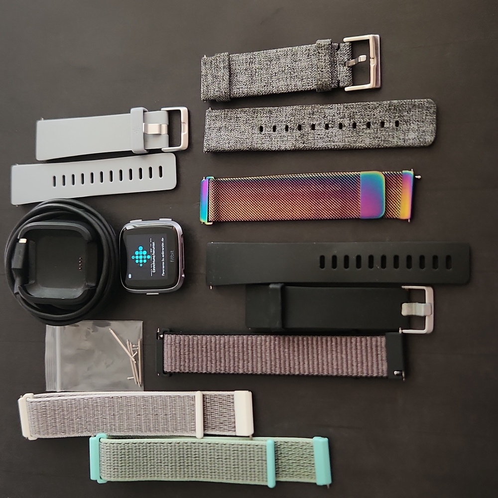 Fitbit Versa with accessories